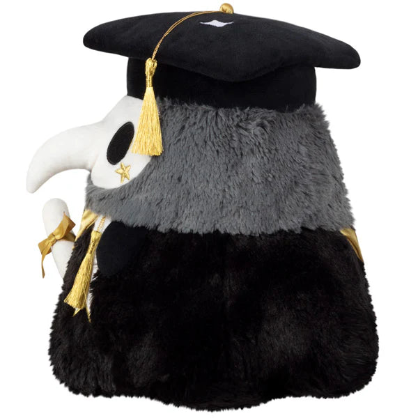 Squishable Mini Graduation Plague Doctor 10-Inch Plush, a black and dark grey soft toy with a white mask, gold accents, a graduation cap, and a diploma