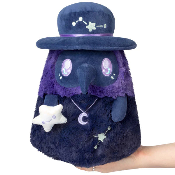Squishable Mini Midnight Plague Doctor 11-Inch Plush, an indigo blue soft toy with a constellation hat and a crescent moon necklace