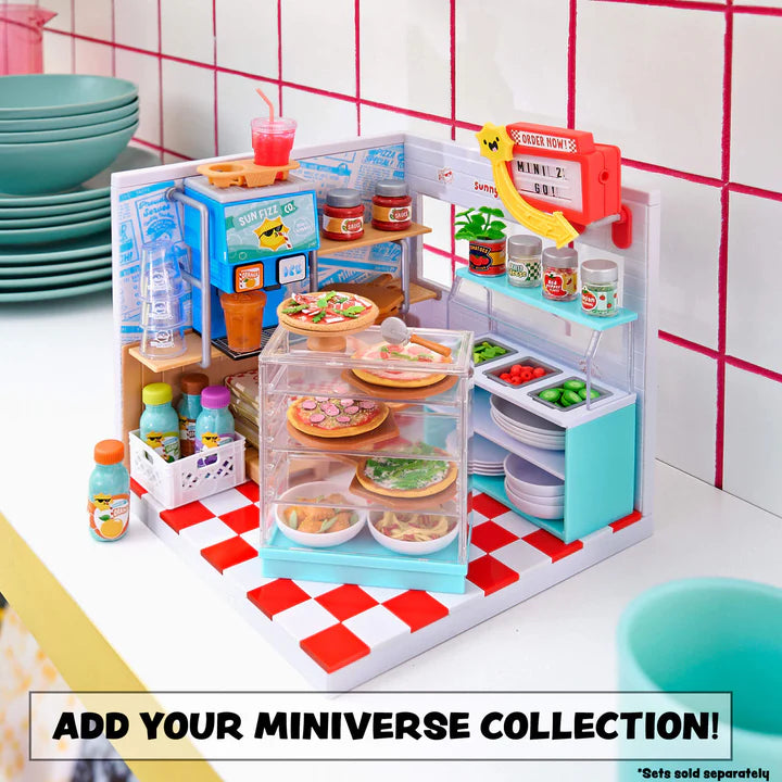 Toy kitchen set with various items on a checkered floor from Miniverse Spaces Pizza Shop Starter Pack display set Canada