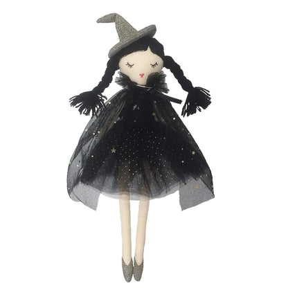 Mon Ami Cassandra Witch Doll wearing a black star-glitter tulle cape, metallic witch hat, and silver shoes.