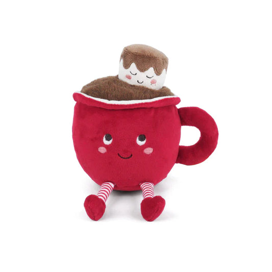 A plush red mug toy with a smiling embroidered face, striped red-and-white legs sitting down, and a plush brown marshmallow with a sleeping face peeking out from the brown plush "cocoa" at the top.