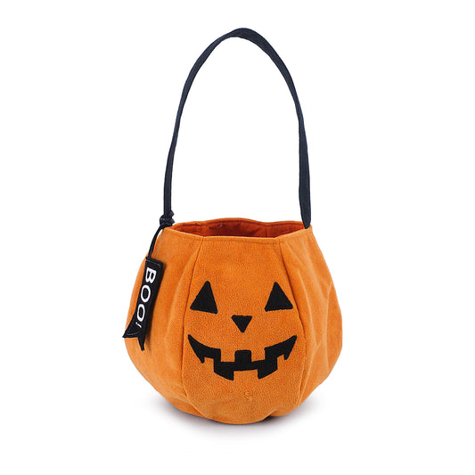 Mon Ami Orange Pumpkin Halloween plush candy bag featuring an embroidered jack-o'-lantern face, black handle, and a BOO tag accent.