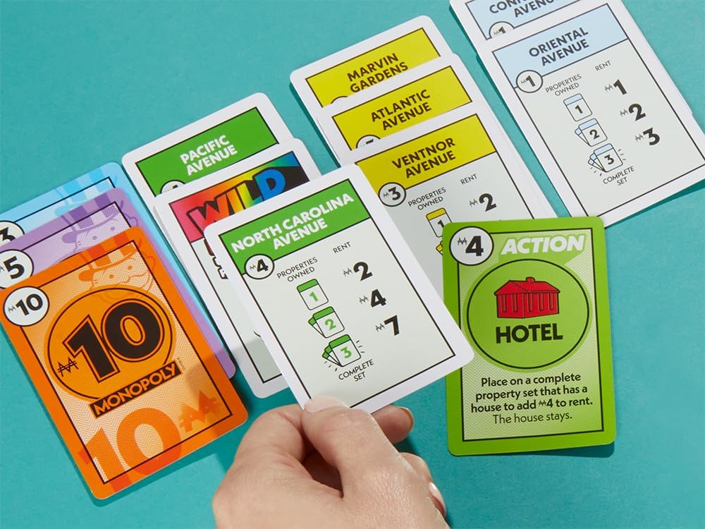 Monopoly game cards on a blue background