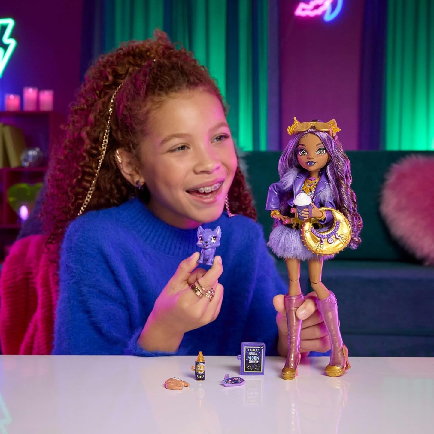 Child playing with Monster High dolls in a colorful room