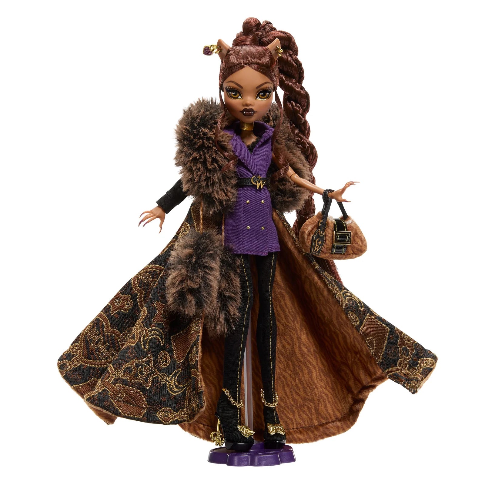 Product view of Monster High House of Wolf Clawdeen Wolf doll wearing a jacquard coat with faux fur and holding a gold-accented handbag.