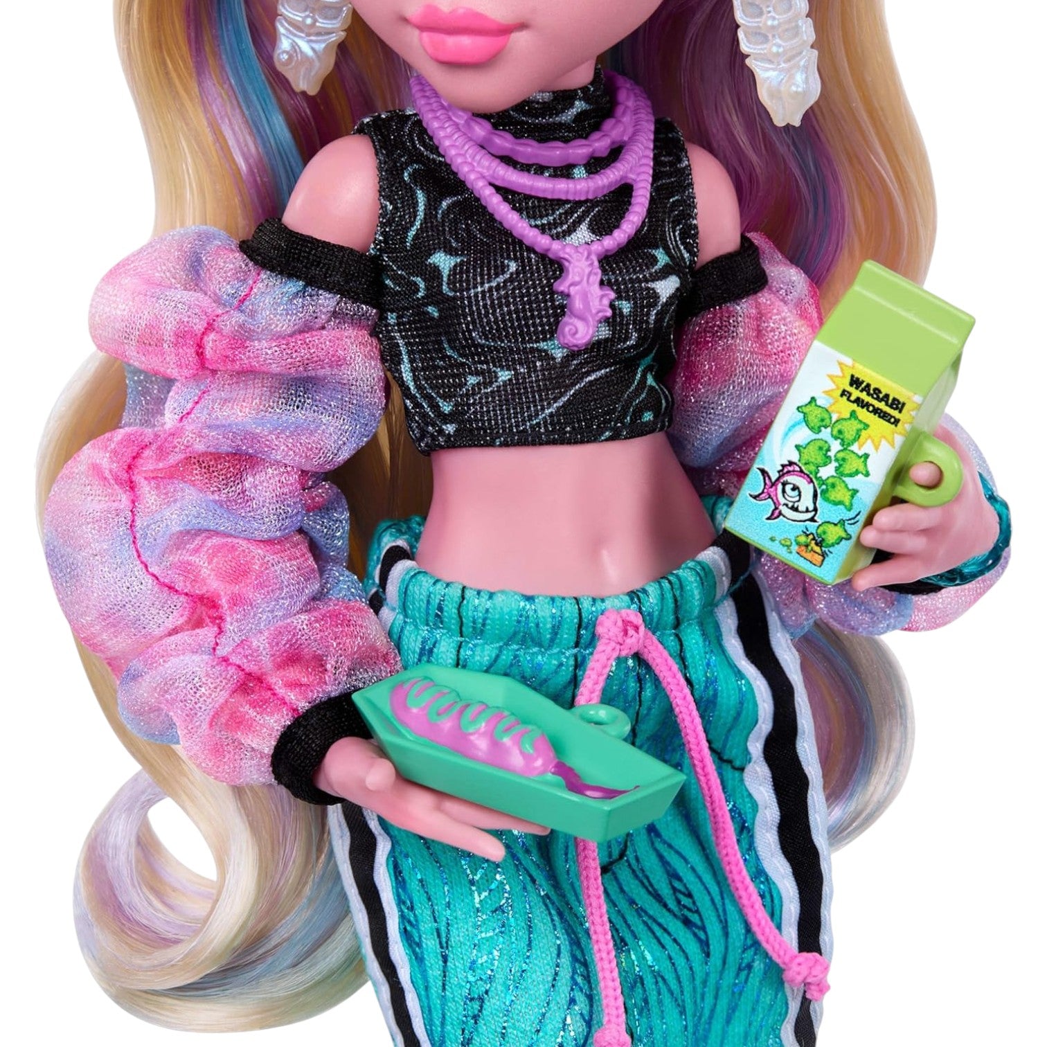 Monster High Lagoona Blue Core Refresh doll with colorful hair and outfit holding a product package.