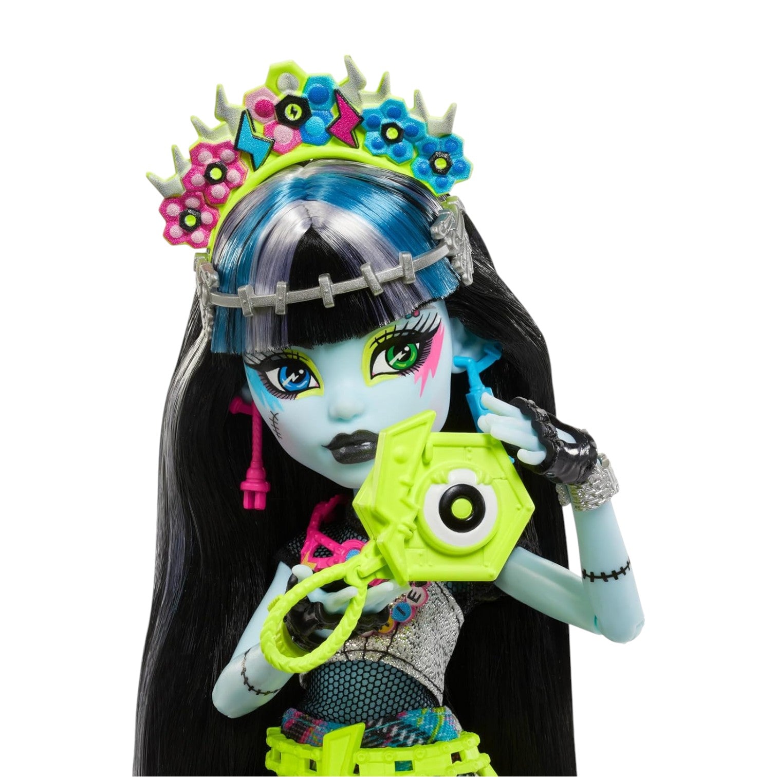 Monster High doll with blue hair, black eyes, and colorful accessories on a white background
