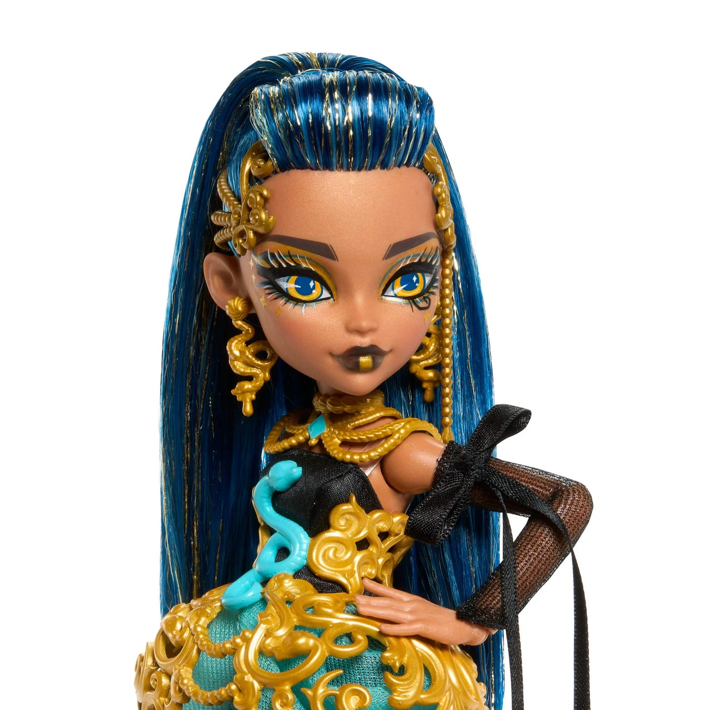 Doll with blue hair and gold and black outfit on a white background
