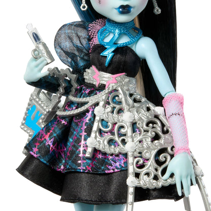 Monster High doll with intricate outfit and accessories on a white background