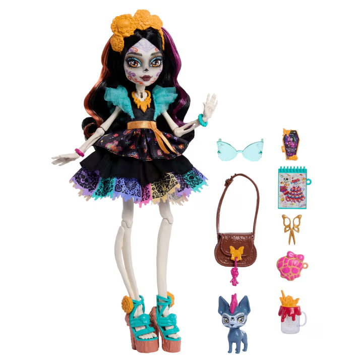 Monster High Skelita Calaveras fashion doll wearing a colorful papel picado dress alongside her pet xolo dog Candelita.