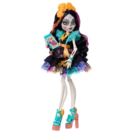 Monster High Skelita Calaveras fashion doll wearing a colorful papel picado dress alongside her pet xolo dog Candelita.