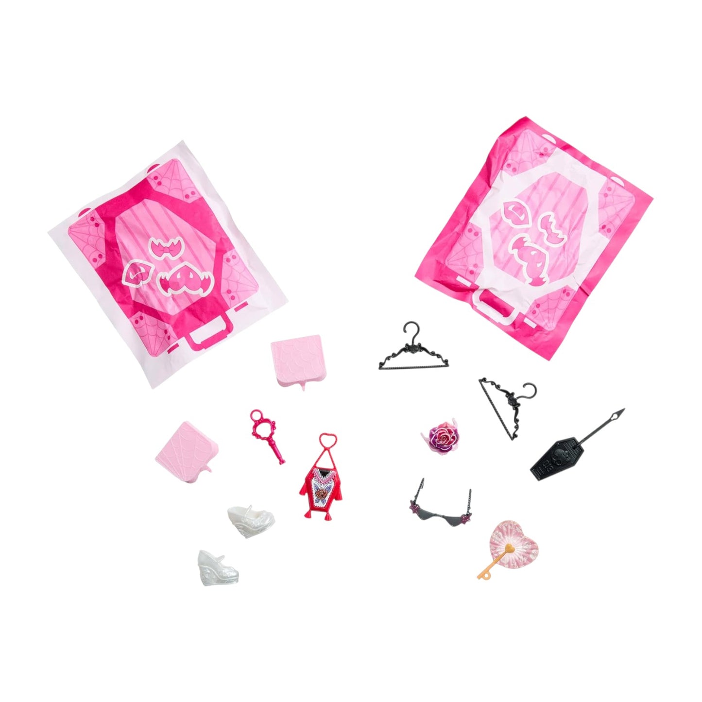 Set of miniature fashion accessories with pink packaging on a white background