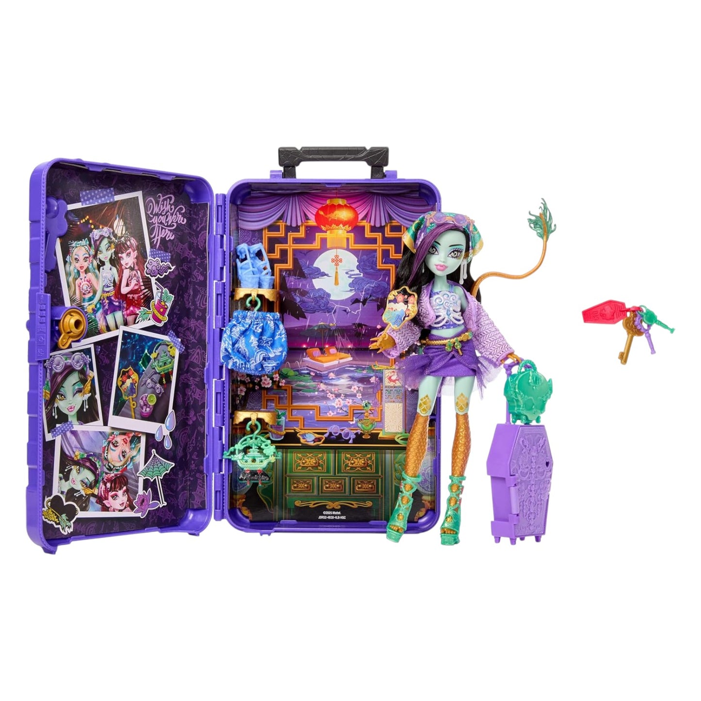 Monster High doll with accessories and open suitcase on a white background