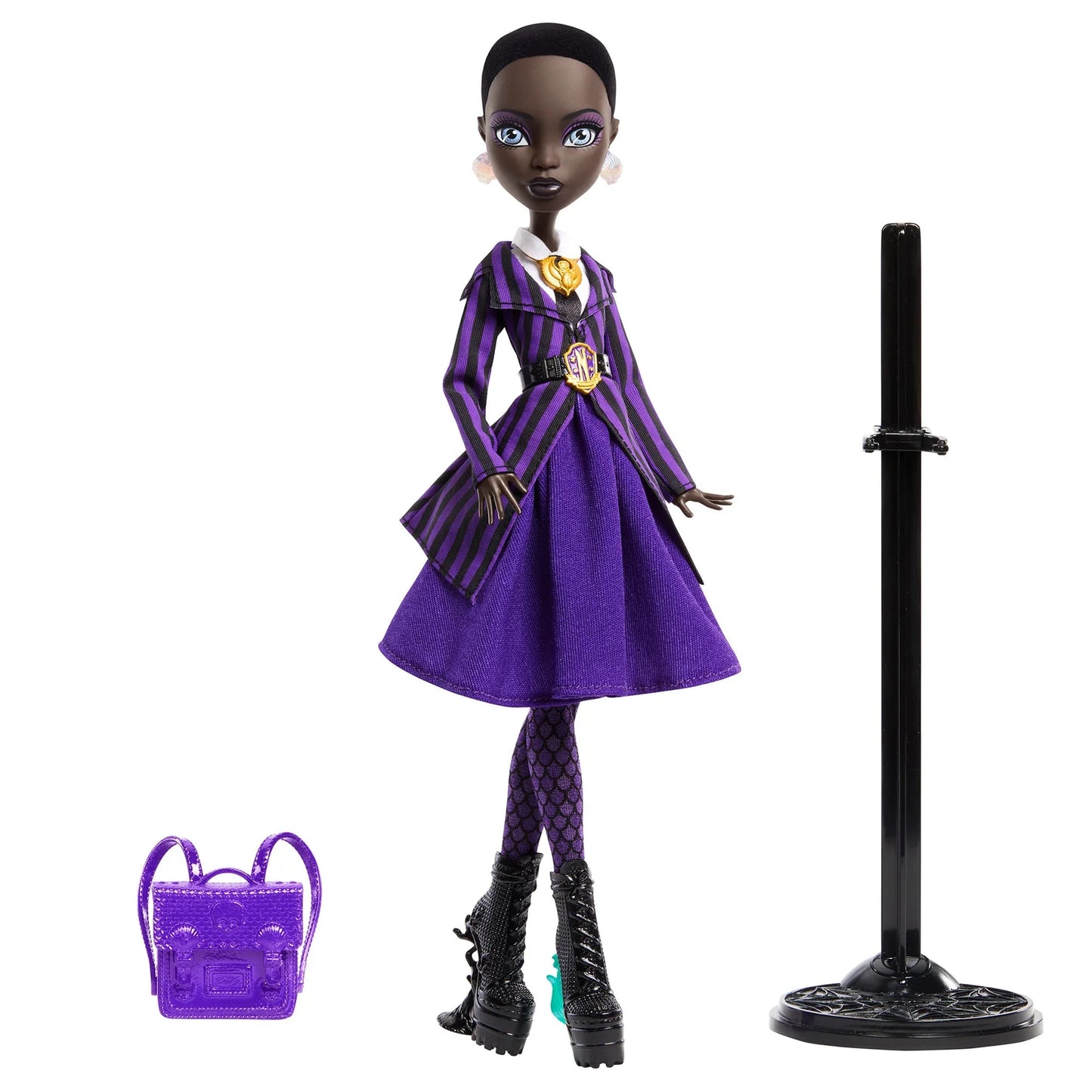 Doll in a purple outfit with a matching handbag on a white background