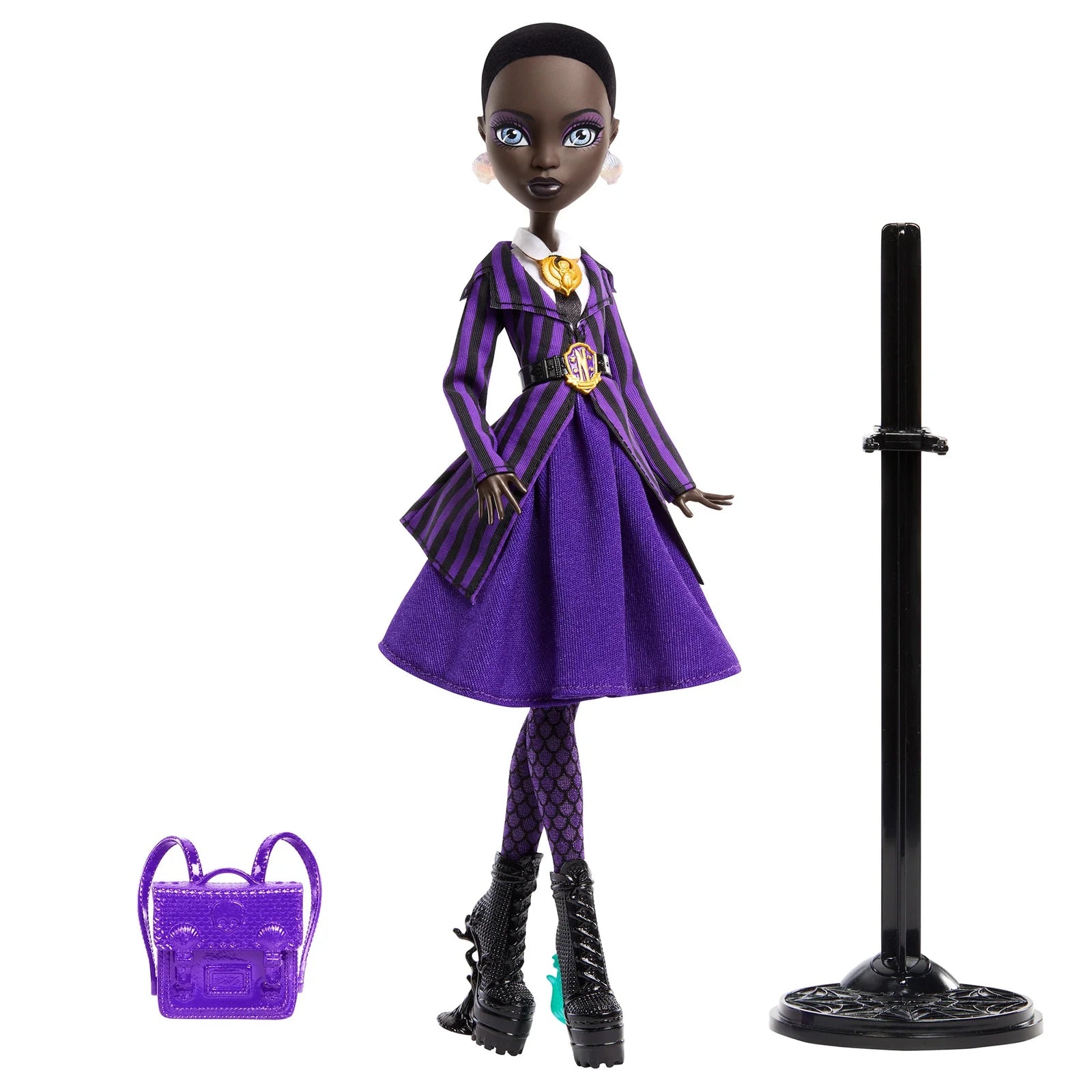 Doll in a purple outfit with a matching handbag on a white background