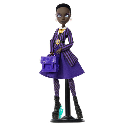 Doll in a purple outfit with a matching handbag on a white background