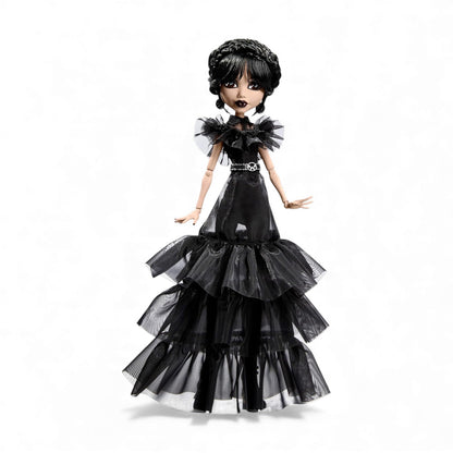 Product view of Monster High x Wednesday Rave'N Wednesday Addams doll wearing a black ruffled gothic gown and posing.