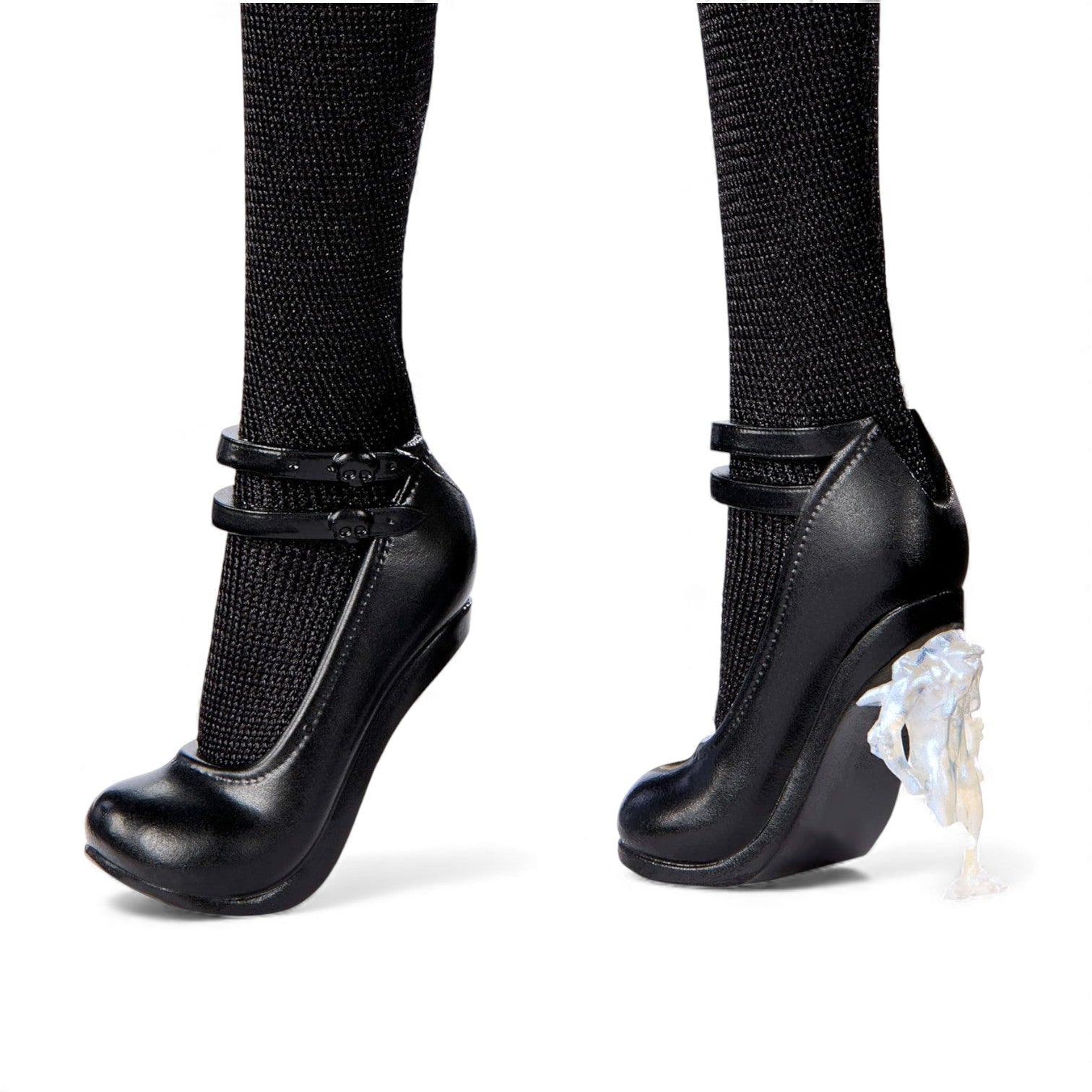 Black shoes with unique heel design on a white background