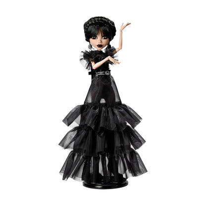 Wednesday Addams Monster High doll in a black gothic-style dress on a white background