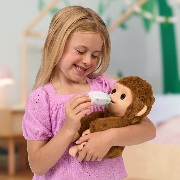 Little Live Pets My Baby Monkey Mango interactive plush toy Canada young girl feeding