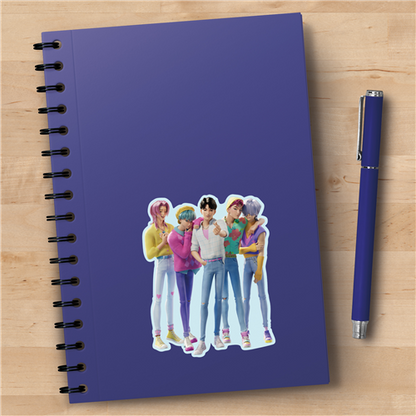 Notebook with colorful character illustration on a wooden surface with a pen.