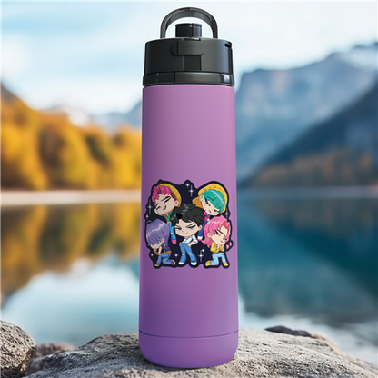 Purple water bottle with cartoon characters on a rock by a lake with mountains in the background