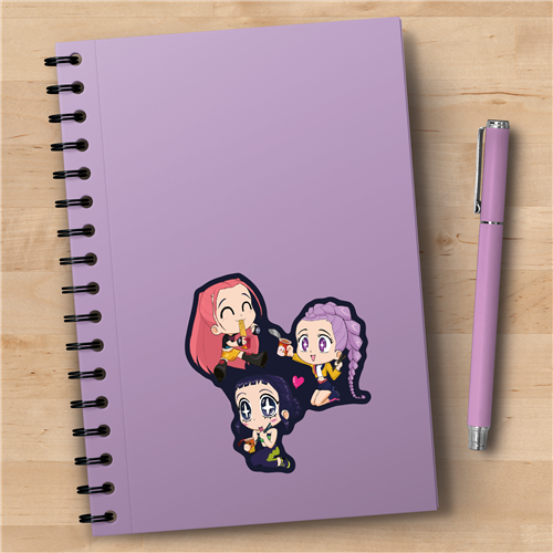 Purple notebook with cartoon characters on a wooden surface next to a pink pen.