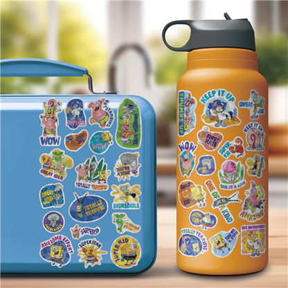 Blue lunch box and orange water bottle with colorful stickers on a blurred outdoor background