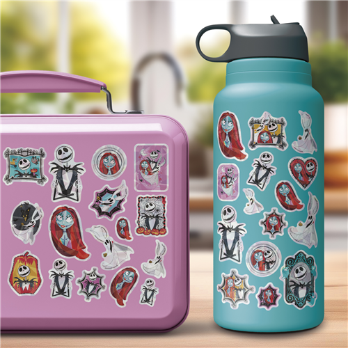 Pink lunch box and blue water bottle with cartoon character stickers on a blurred outdoor background