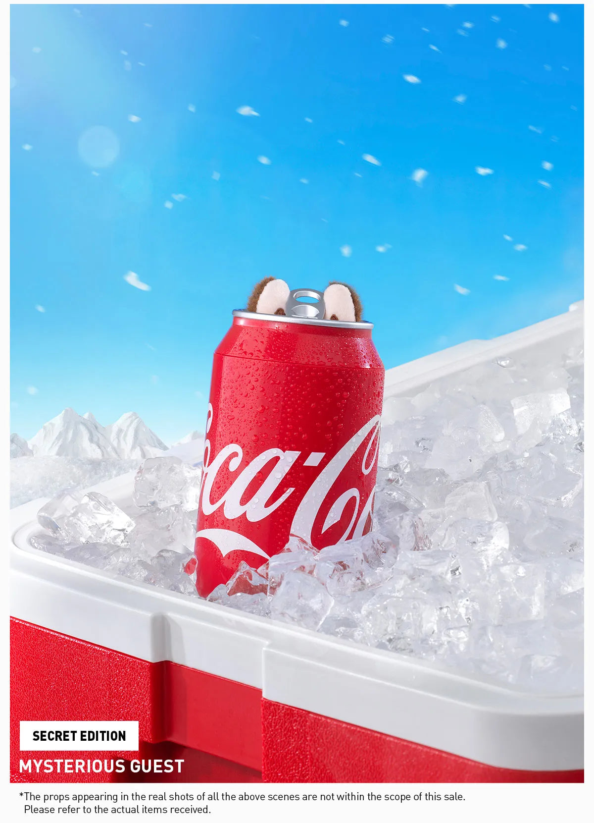 Coca-Cola can in a cooler with ice against a blue sky background