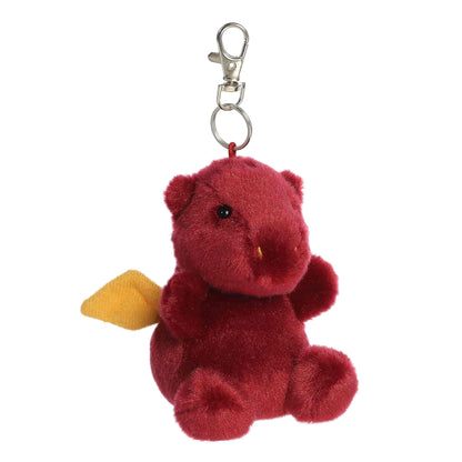 Palm Pals Aidan Dragon 4-inch clip-on plush soft toy, a deep red dragon with golden wings attached to a clip.