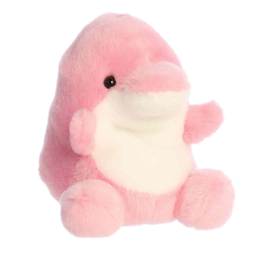 A product photo of the Palm Pals Amazonia Pink Dolphin 5-Inch Plush, a soft pink stuffed dolphin with a white belly and fins, sitting on a white background.