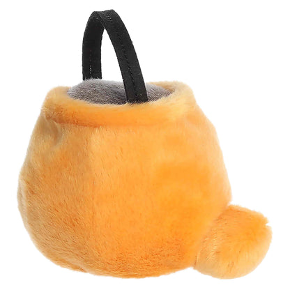 Palm Pals Bucky Candy Bucket 4-inch orange plush pumpkin treat bag with a black handle and embroidered jack-o'-lantern mouth.