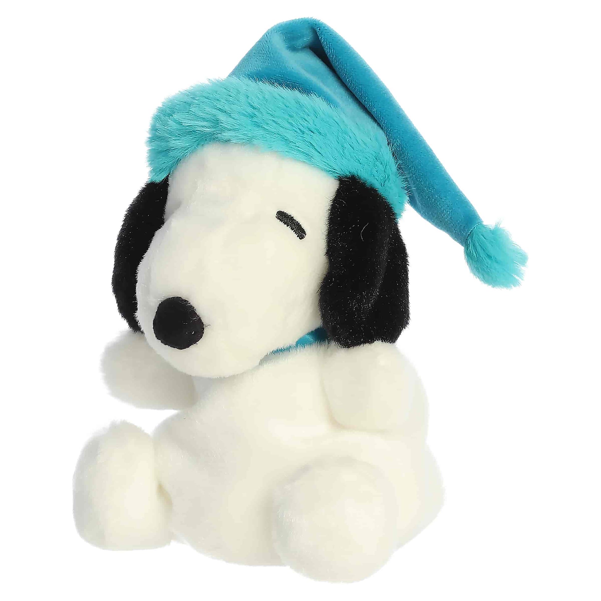 Palm Pals Bundled Up Snoopy plush wearing a teal blue winter cap with a turquoise faux fur trim and pom-pom.