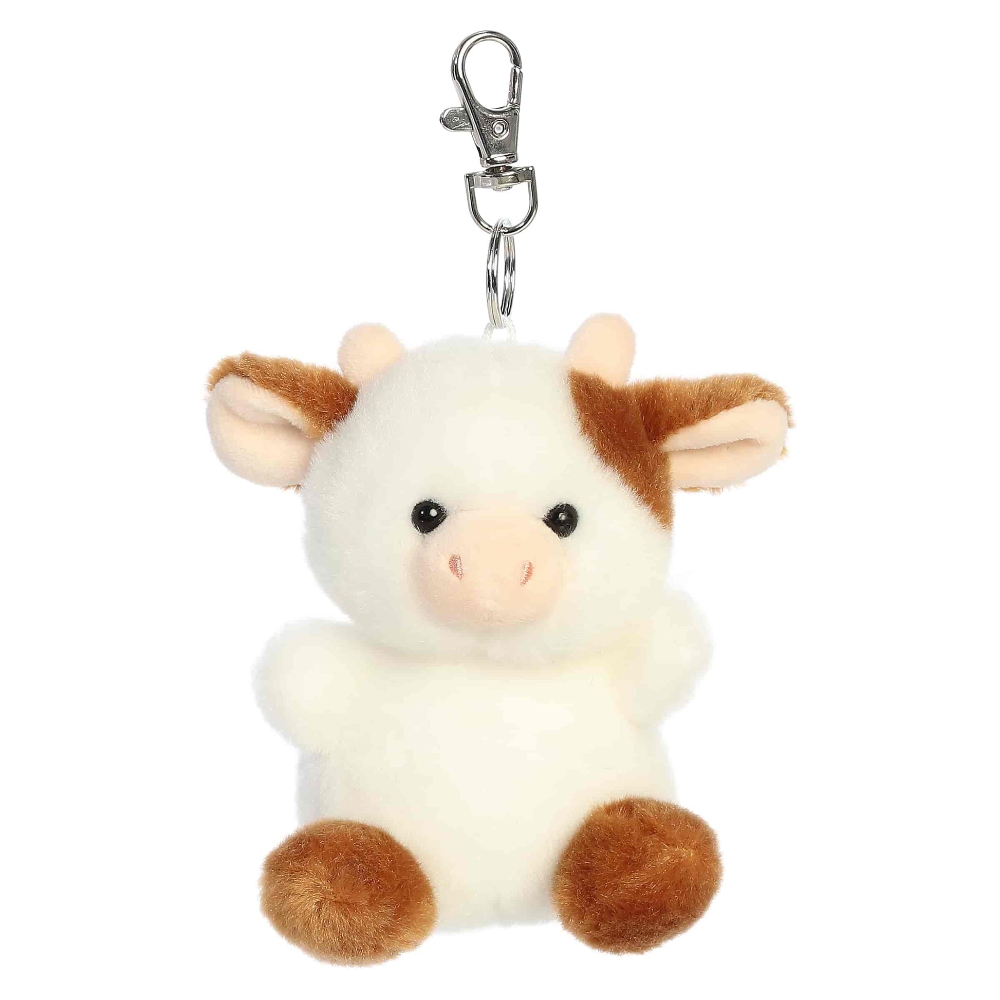Palm Pals Caroline Brown Cow Clip-On plush featuring soft brown and white fur, cute little horns, and a metal keychain clip.