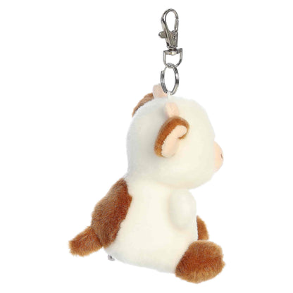 Palm Pals Caroline Brown Cow Clip-On plush featuring soft brown and white fur, cute little horns, and a metal keychain clip.