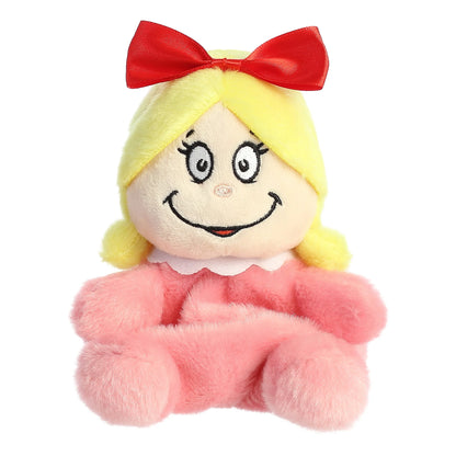 Palm Pals Cindy-Lou Who 5-inch plush toy, a small girl character with yellow hair, red bow, and pink dress.