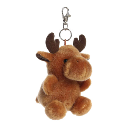 Angled view of Palm Pals Cinnamon Moose, a 4-inch brown plush clip.