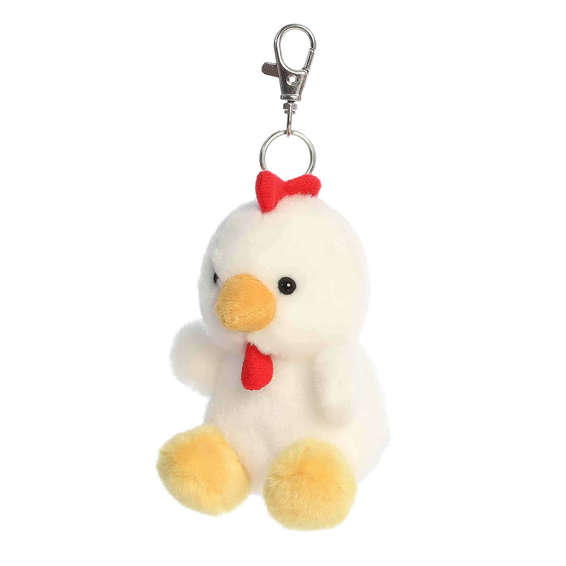 Angled view of Palm Pals Cooper Chicken, a 4-inch white plush clip.