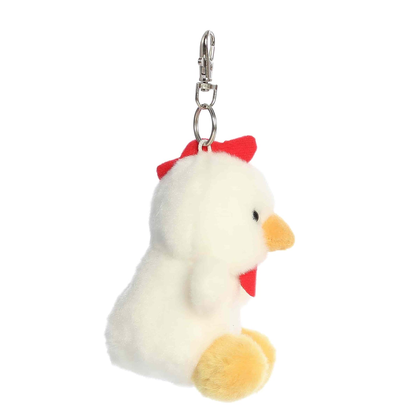 Side view of Palm Pals Cooper Chicken, a 4-inch white plush clip.