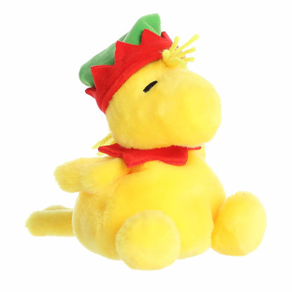 Palm Pals Elf Woodstock plush featuring bright yellow fur, a green elf hat with red trim, and a red collar.