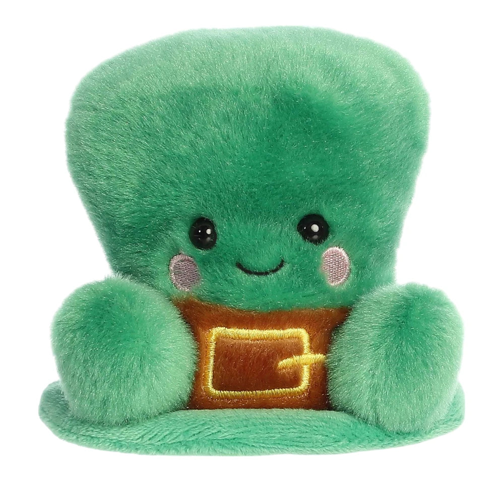 A product photo of the Palm Pals Finnigan Leprechaun Hat plush, a soft green top hat stuffed animal with a brown belt and gold buckle, sitting on a white background.