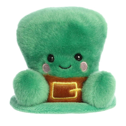 A product photo of the Palm Pals Finnigan Leprechaun Hat plush, a soft green top hat stuffed animal with a brown belt and gold buckle, sitting on a white background.