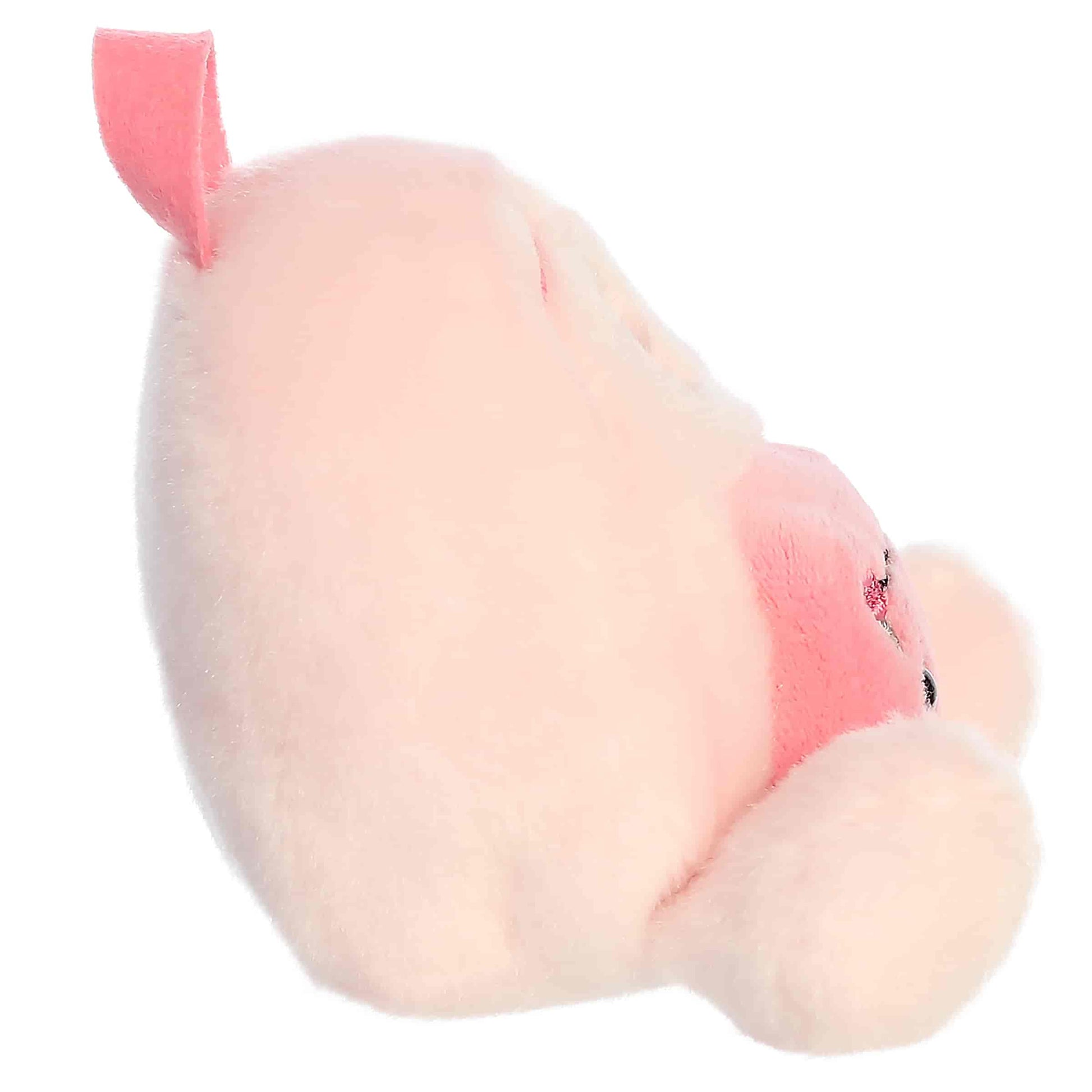 Palm Pals Francisca Backpack, a small pink plush shaped like a backpack with a sweet smiling face and an embroidered strawberry patch.