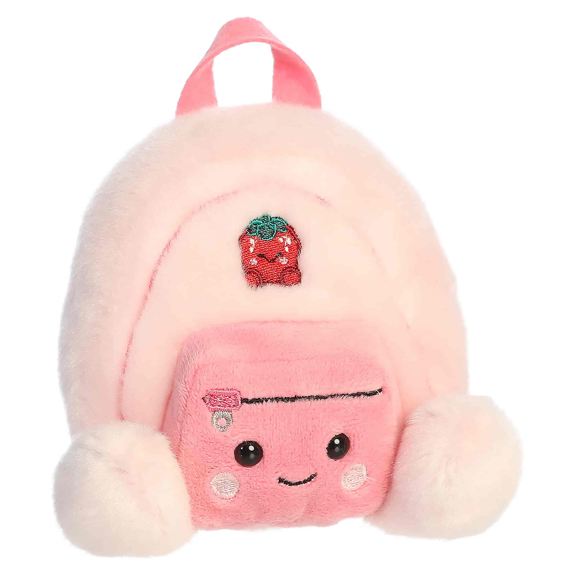 Palm Pals Francisca Backpack, a small pink plush shaped like a backpack with a sweet smiling face and an embroidered strawberry patch.