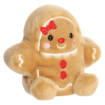 Palm Pals Gia Gingerbread Girl 5-inch tan plush with an embroidered red bow, white icing accents, red buttons, and pink cheeks.