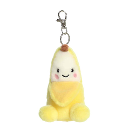 Palm Pals Gwen Banana 4-inch clip-on plush soft toy, a yellow banana with a happy face attached to a clip.