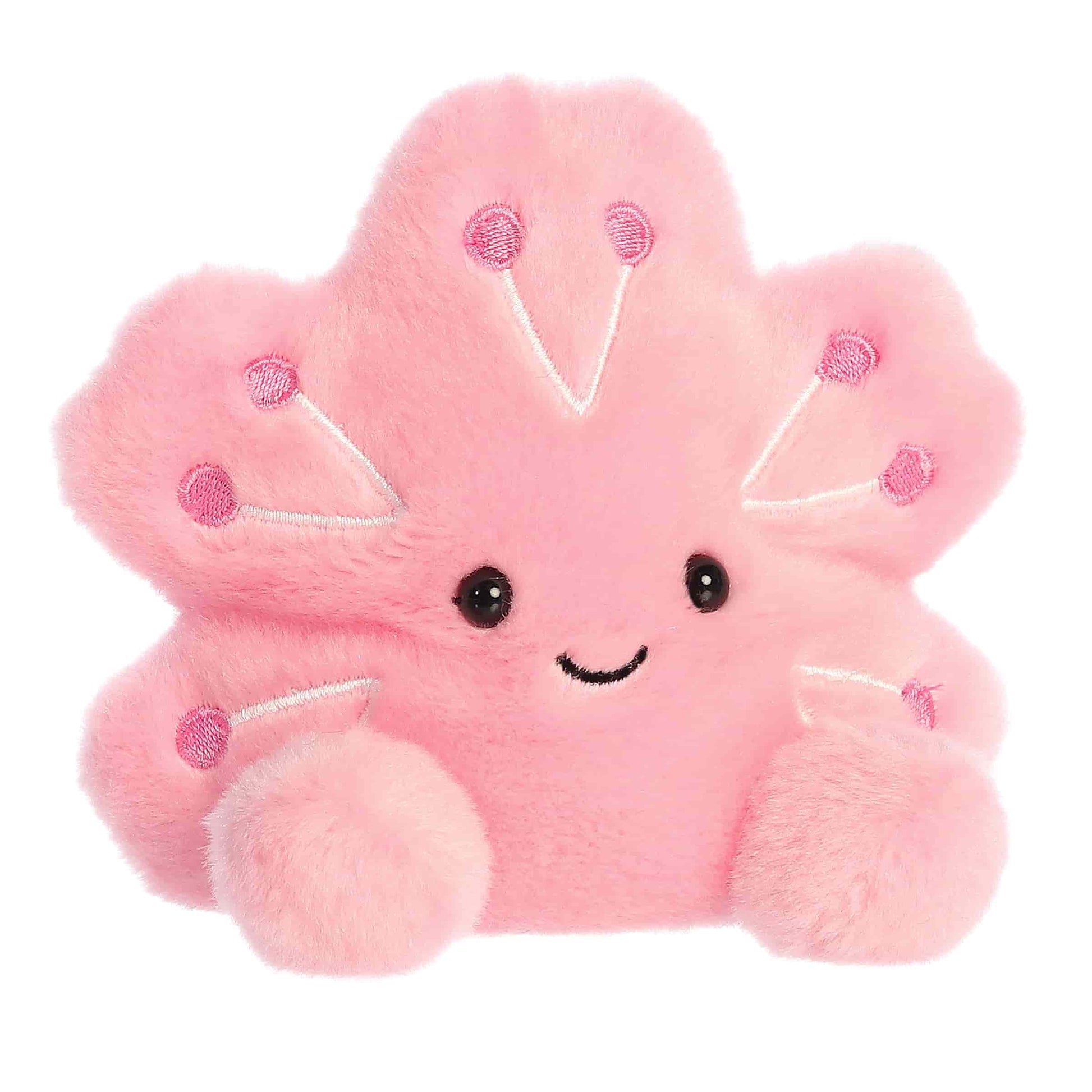 Angled view of Palm Pals Cherry Blossom Plush