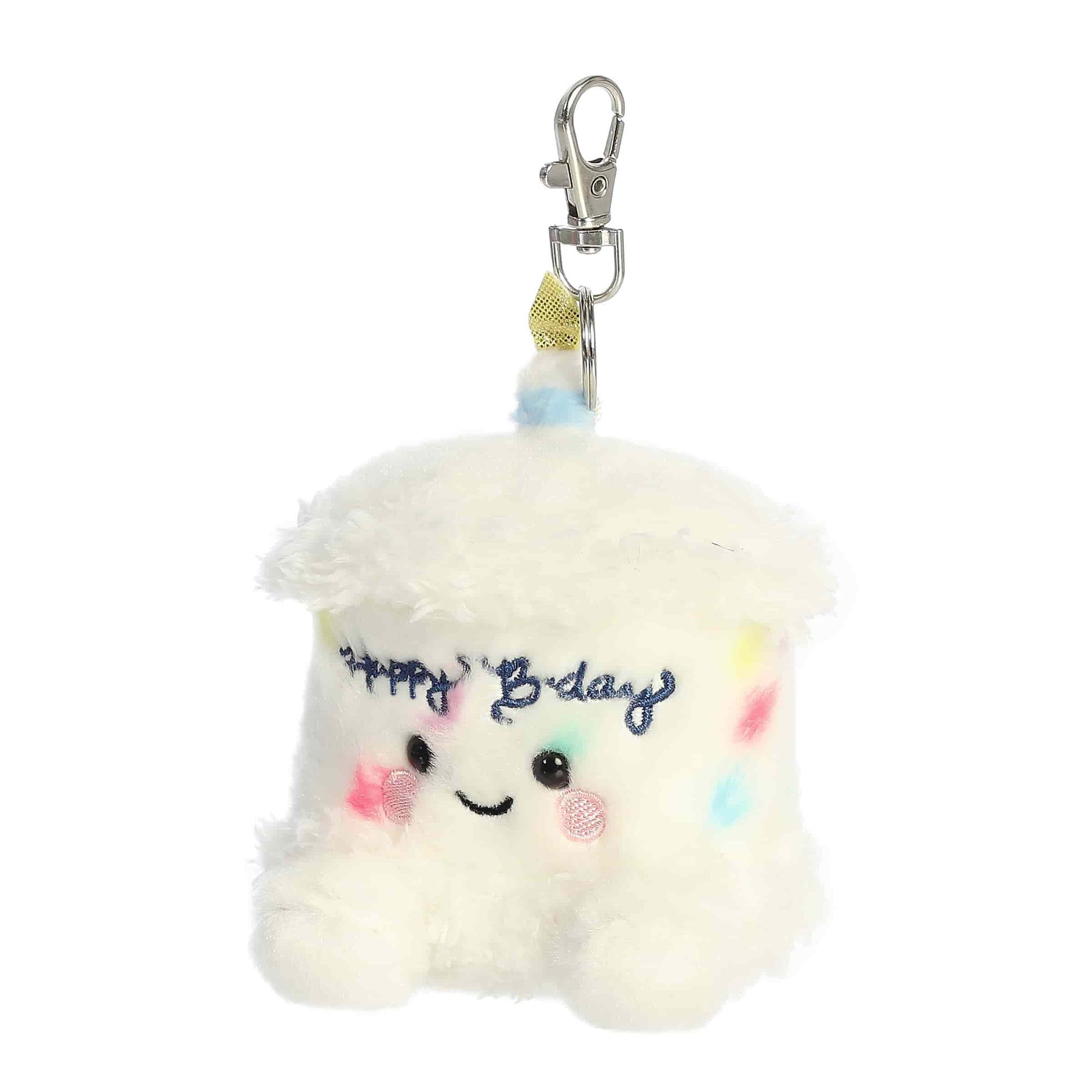 Plush keychain with a smiling face and 'Happy Birthday' text on a white background