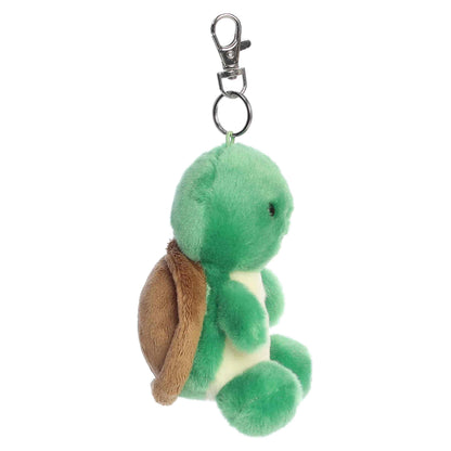 Palm Pals Honu Sea Turtle Clip-On plush featuring a soft green body, light yellow belly, and a metal keychain clip.